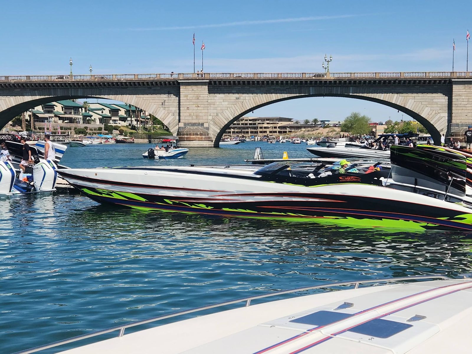Performance boat under the London Bridge in Lake Havasu City