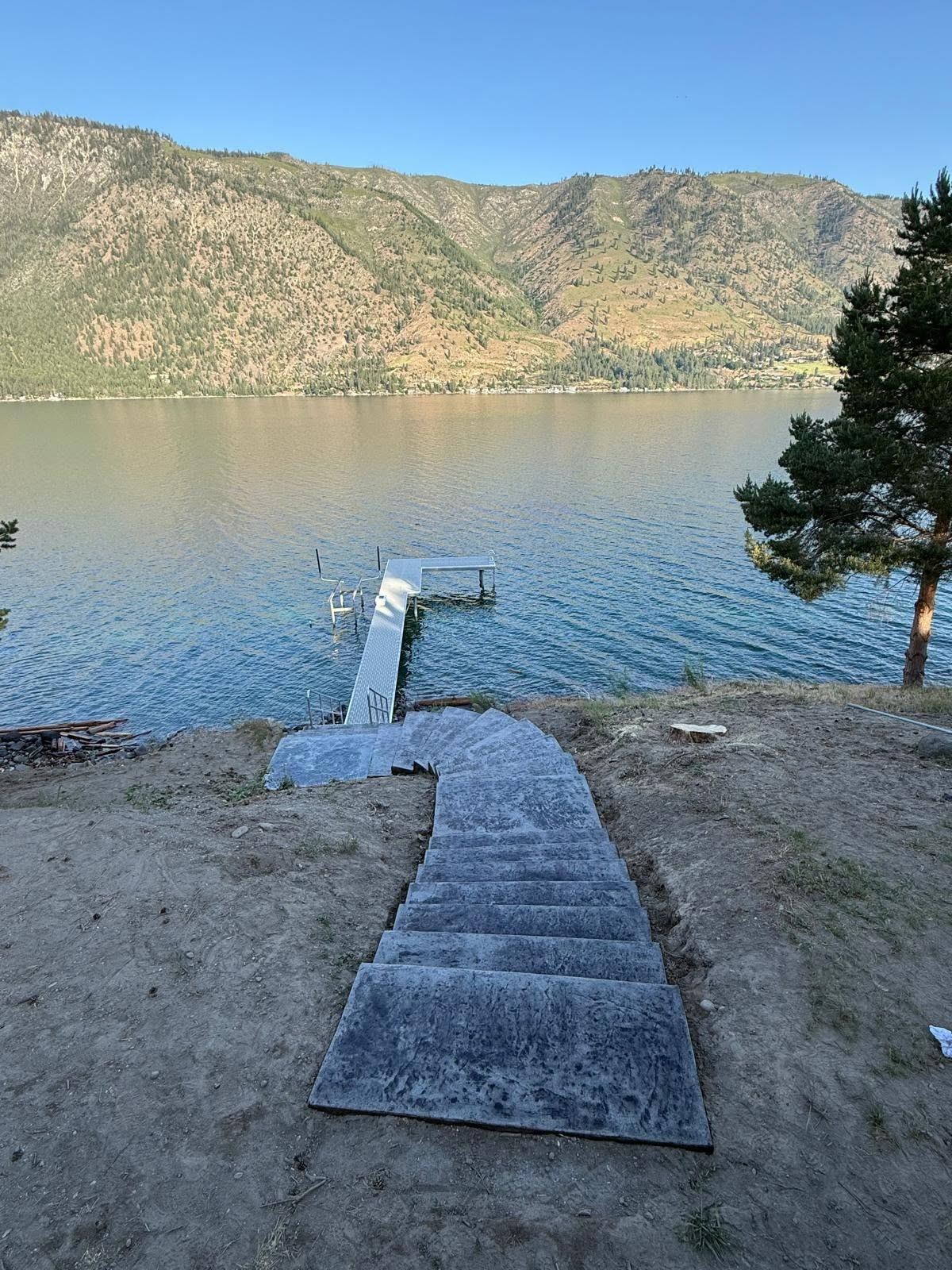 Stamped concrete steps leading to a dock on Lake Chelan